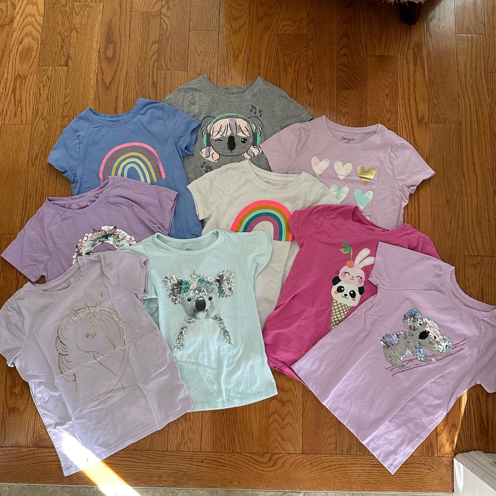 (9) short sleeve Cat & Jack tee shirts. Gently used